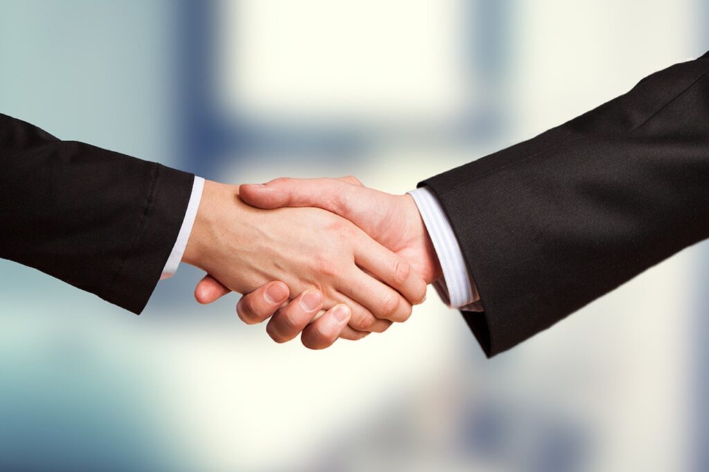 handshake business agreement hands 7346772